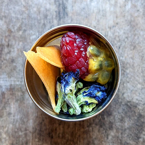 Butterfly pea infusion raspberry grapefruit and passion fruit